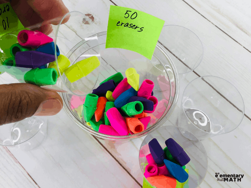 Sorting erasers by larger numbers in classroom estimation activity